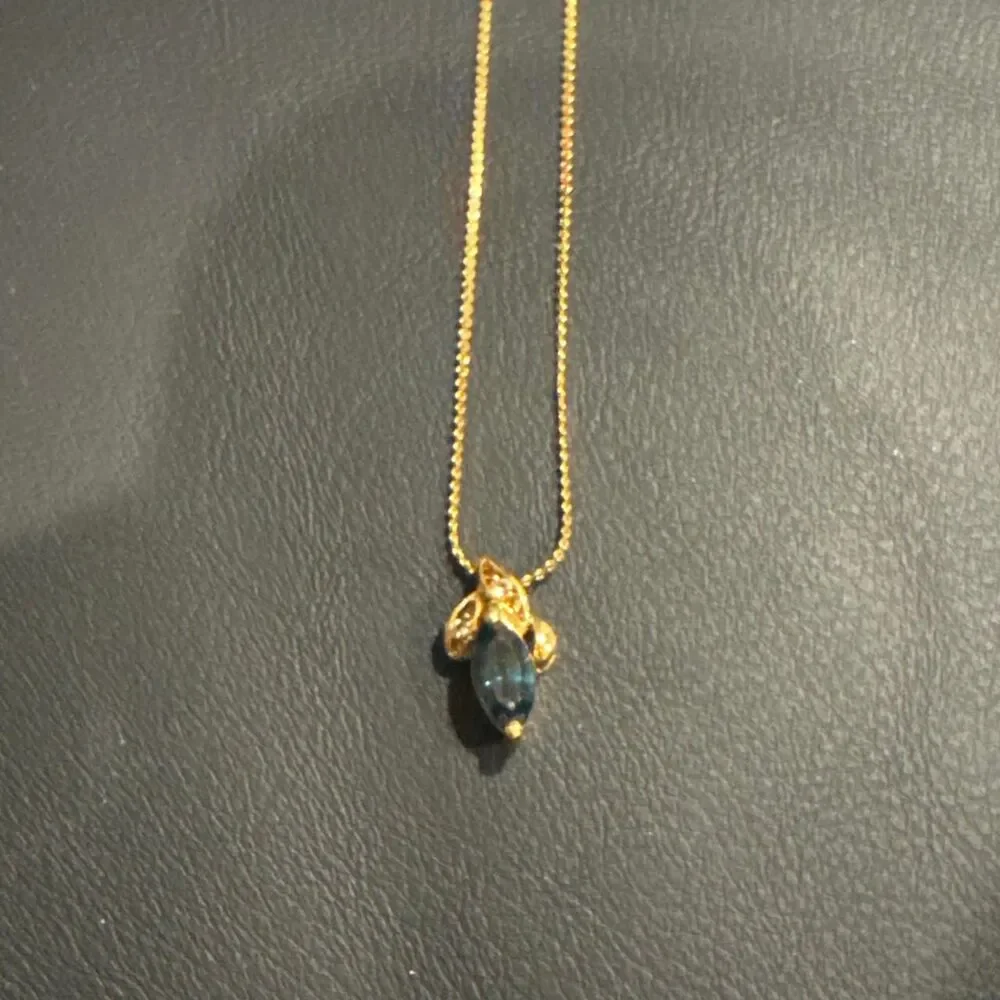 Source Unknown gold necklace